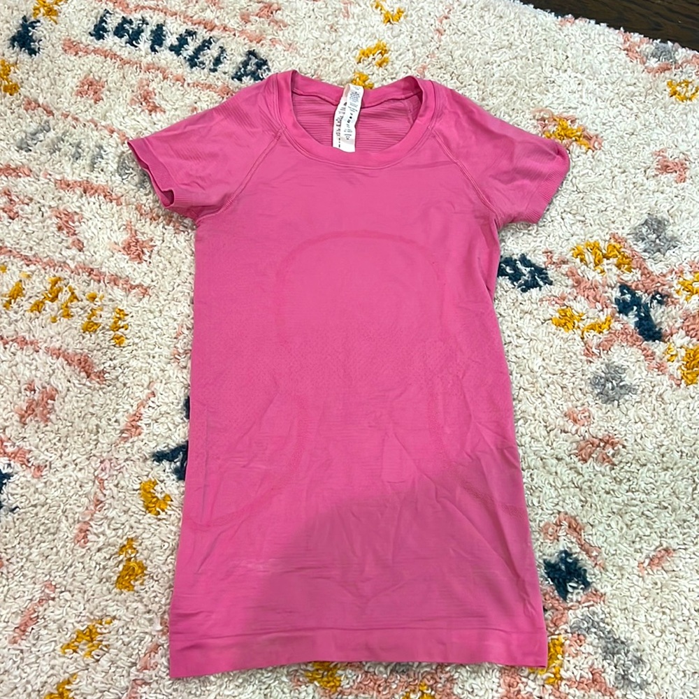 RARE  lululemon pink blossom switfly tech size 0